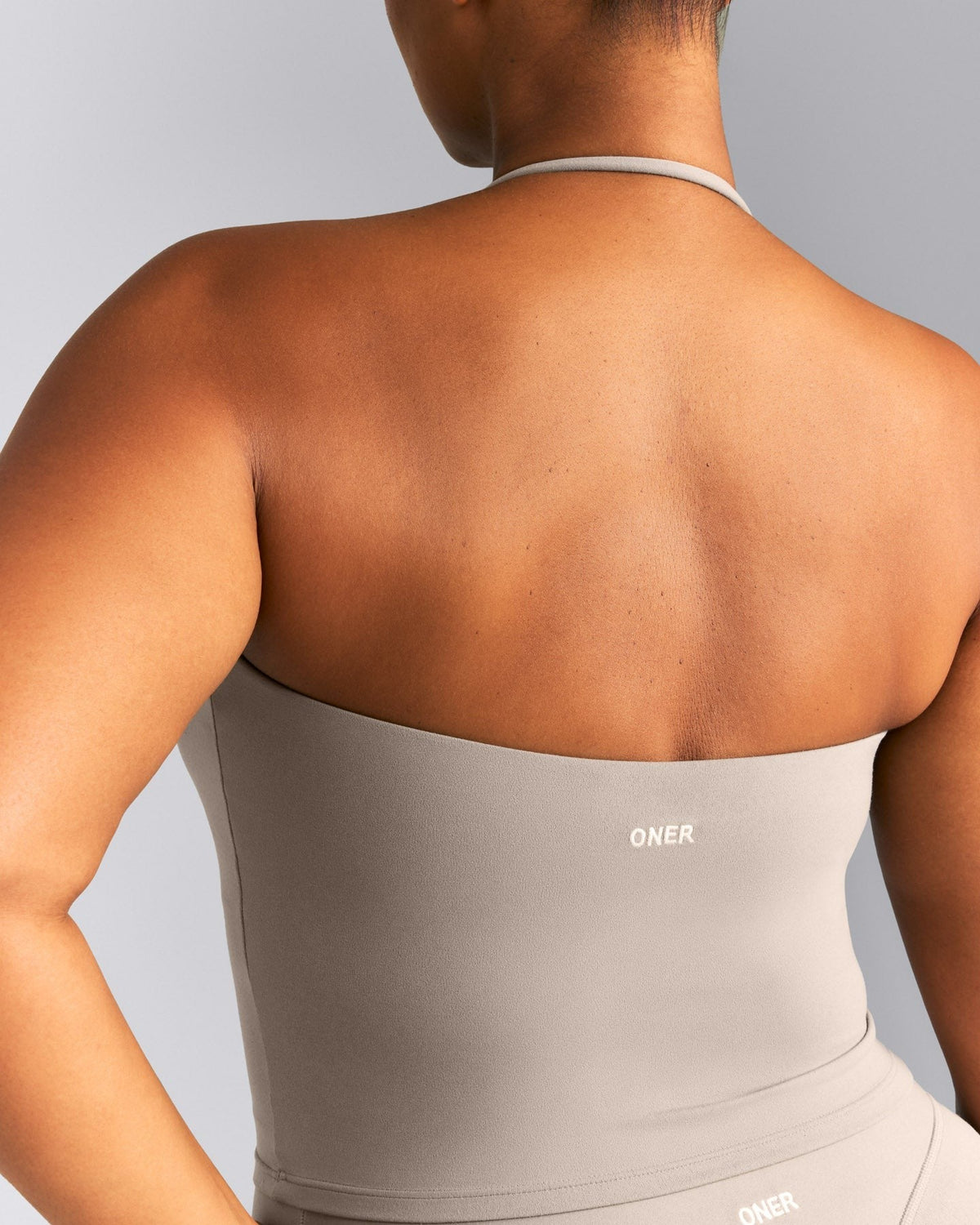 SoftMotionTM Strappy Halter Neck Mid Tank Top with Built in Bra Shelf | Warm Sand