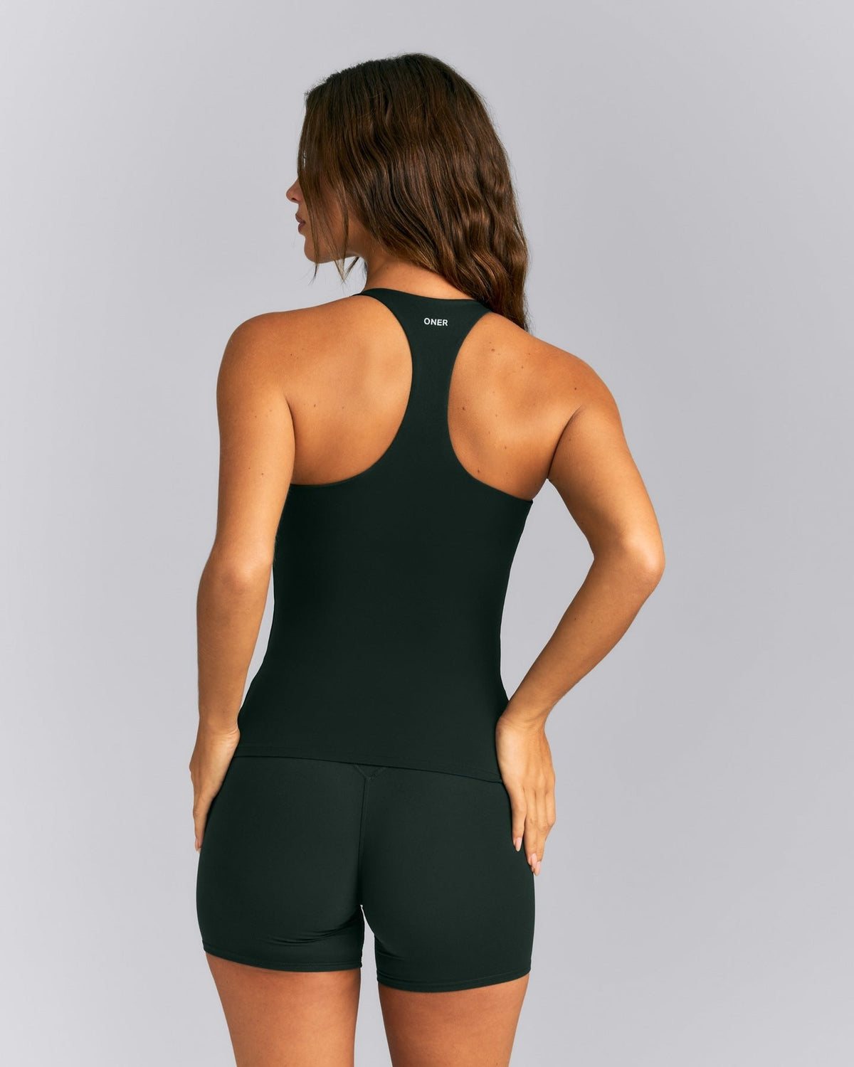 SoftMotionTM Racer Back Tank Top with Built in Bra Shelf | Emerald Noir