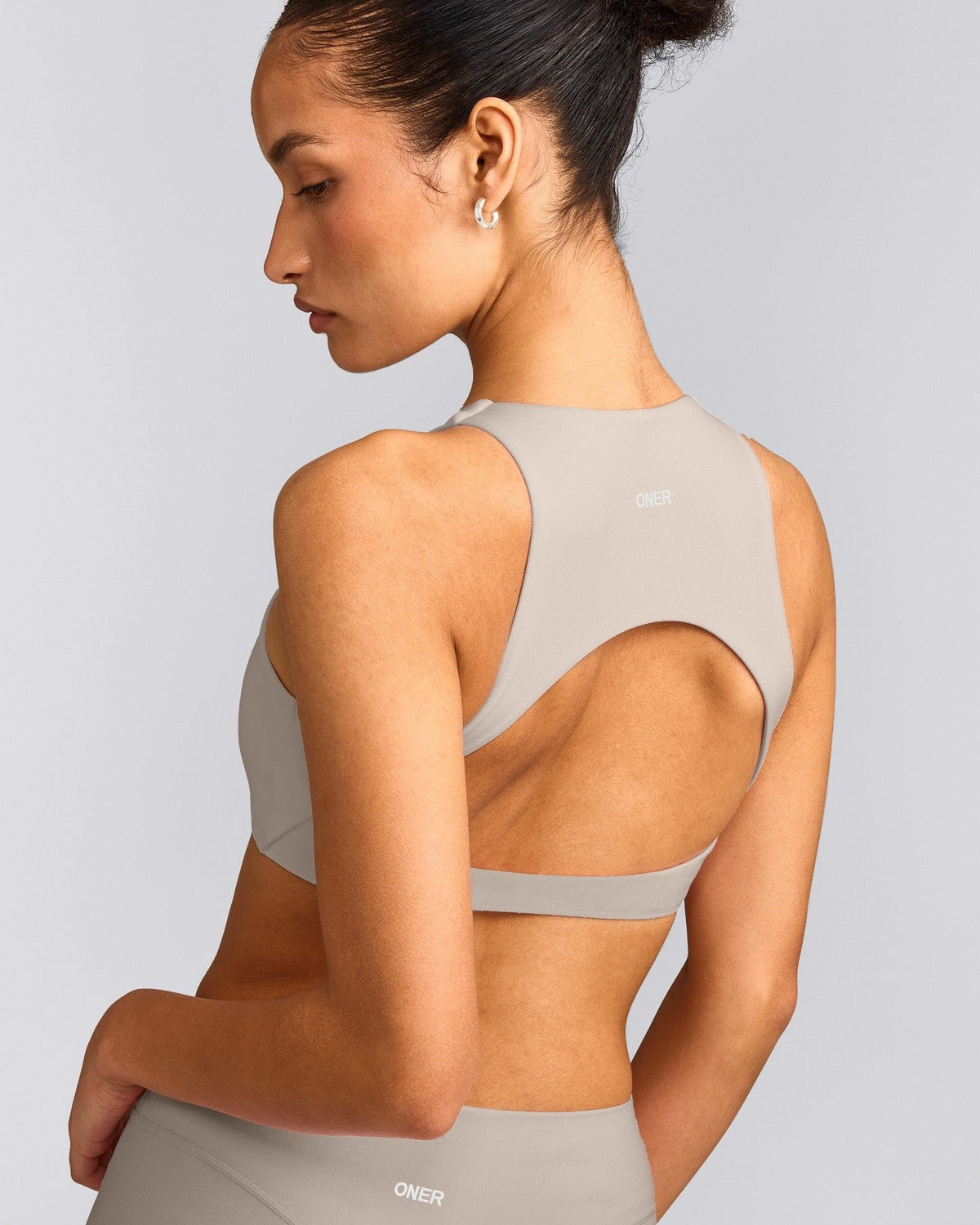 SoftMotionTM High Neck Sports Bra | Warm Sand