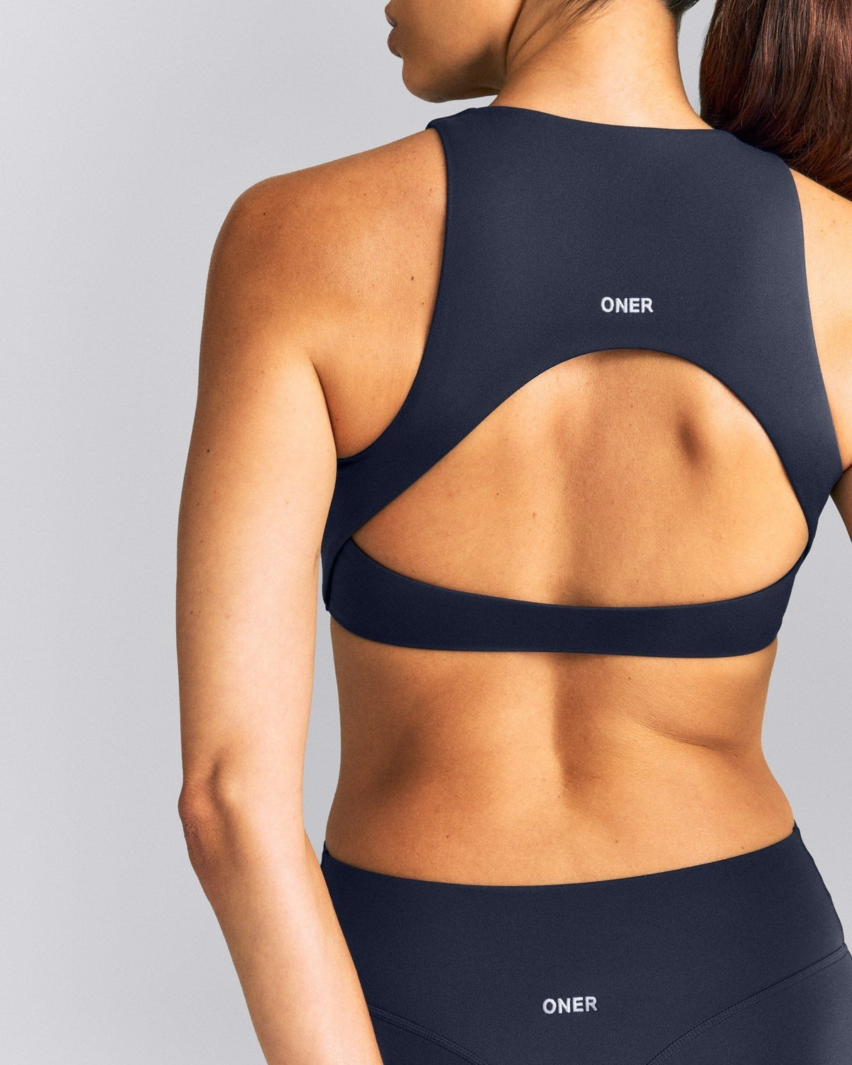 SoftMotionTM High Neck Sports Bra | True Blue