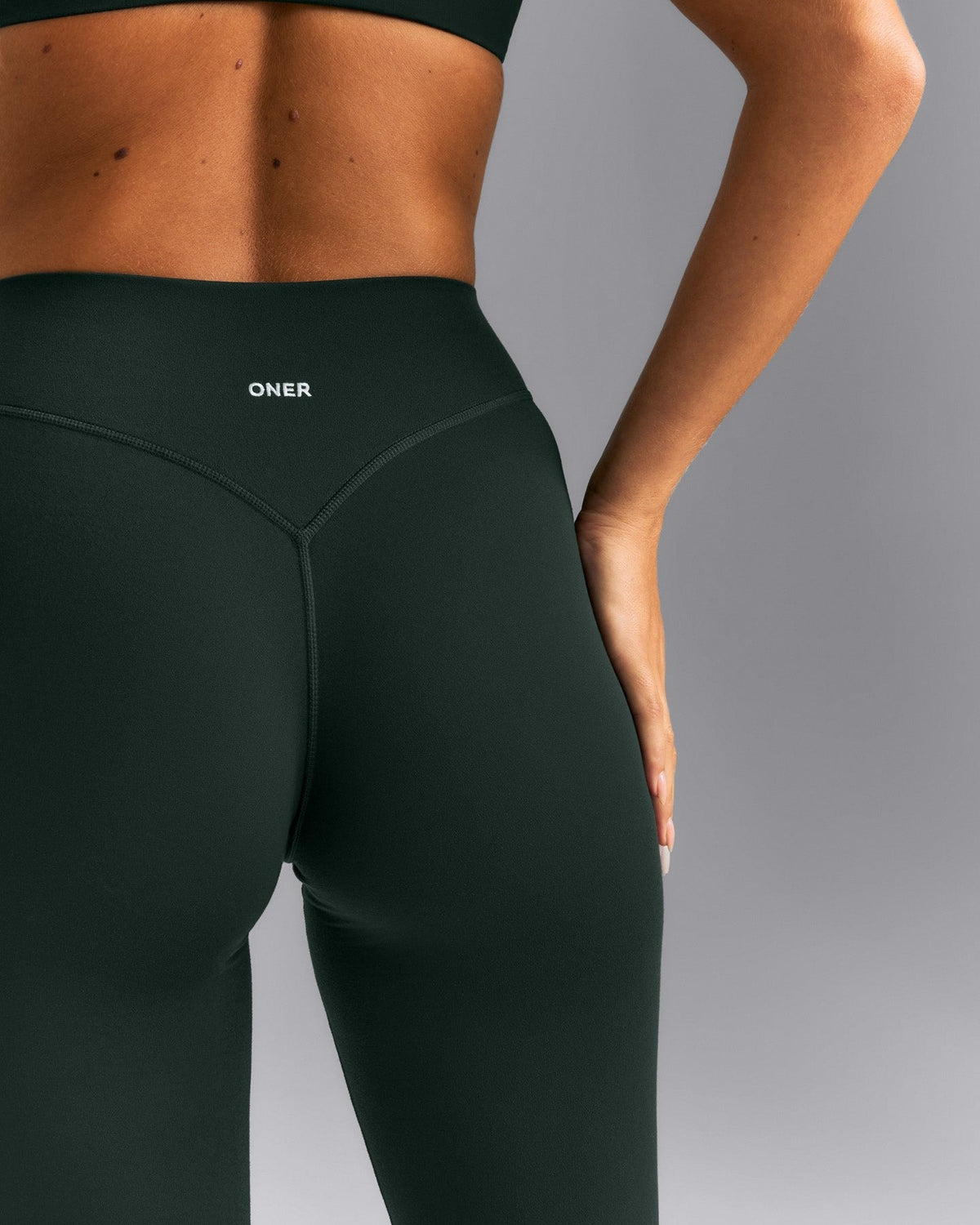 SoftMotionTM High Waisted Leggings | Emerald Noir