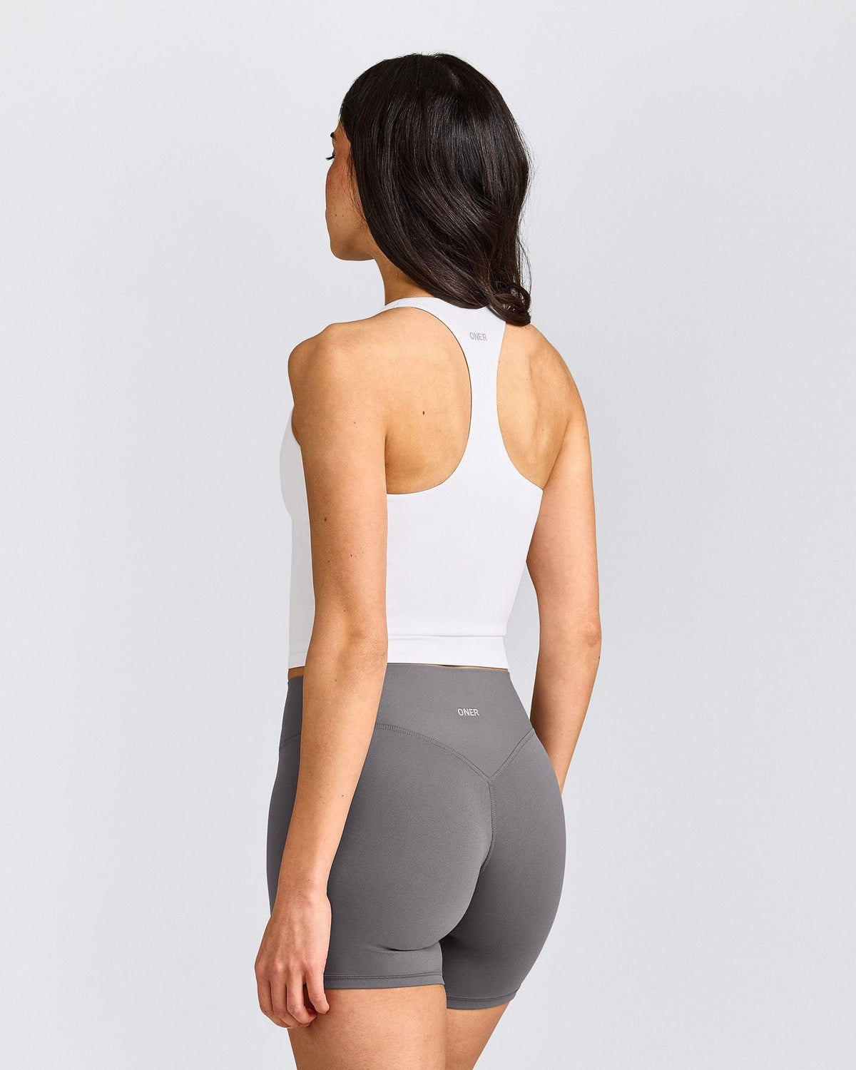 SoftMotionTM Racer Back Mid Tank Top With Built in Bra Shelf | White