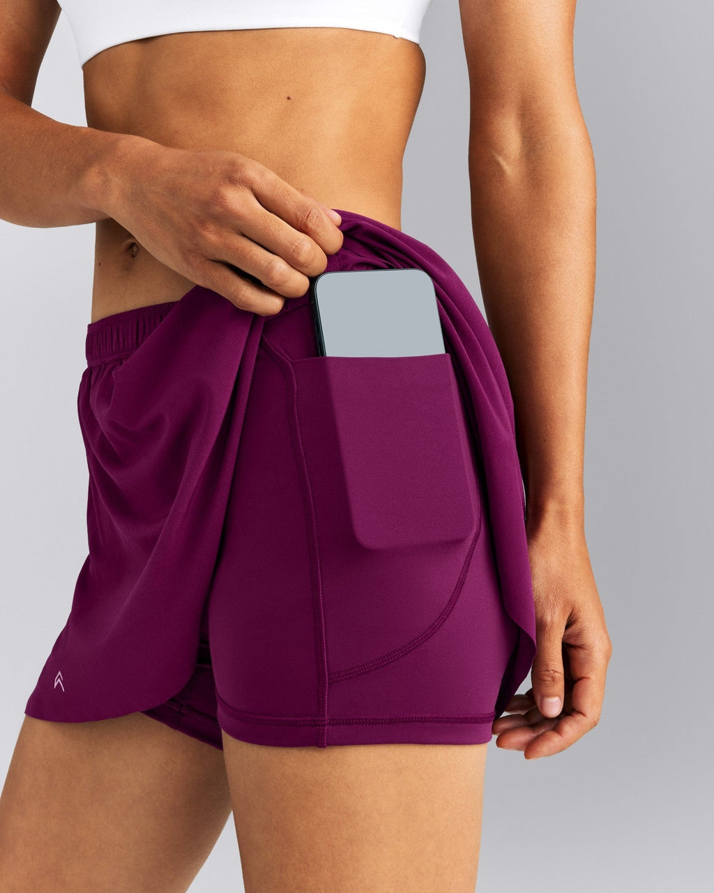 AirMoveTM Skort with Pockets | Ripe Fig
