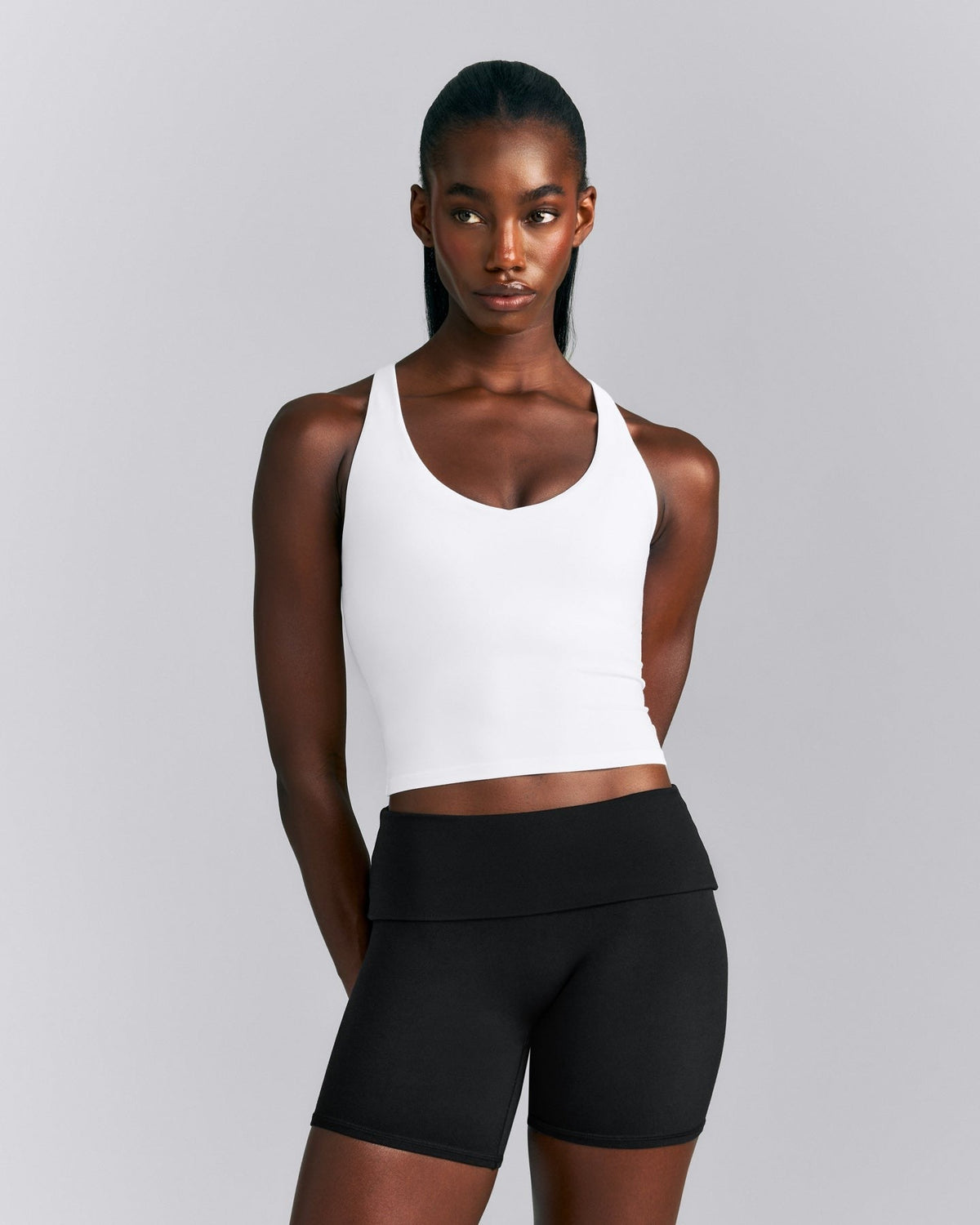 SoftMotionTM Racer Back Mid Tank Top with Built in Bra Shelf | White