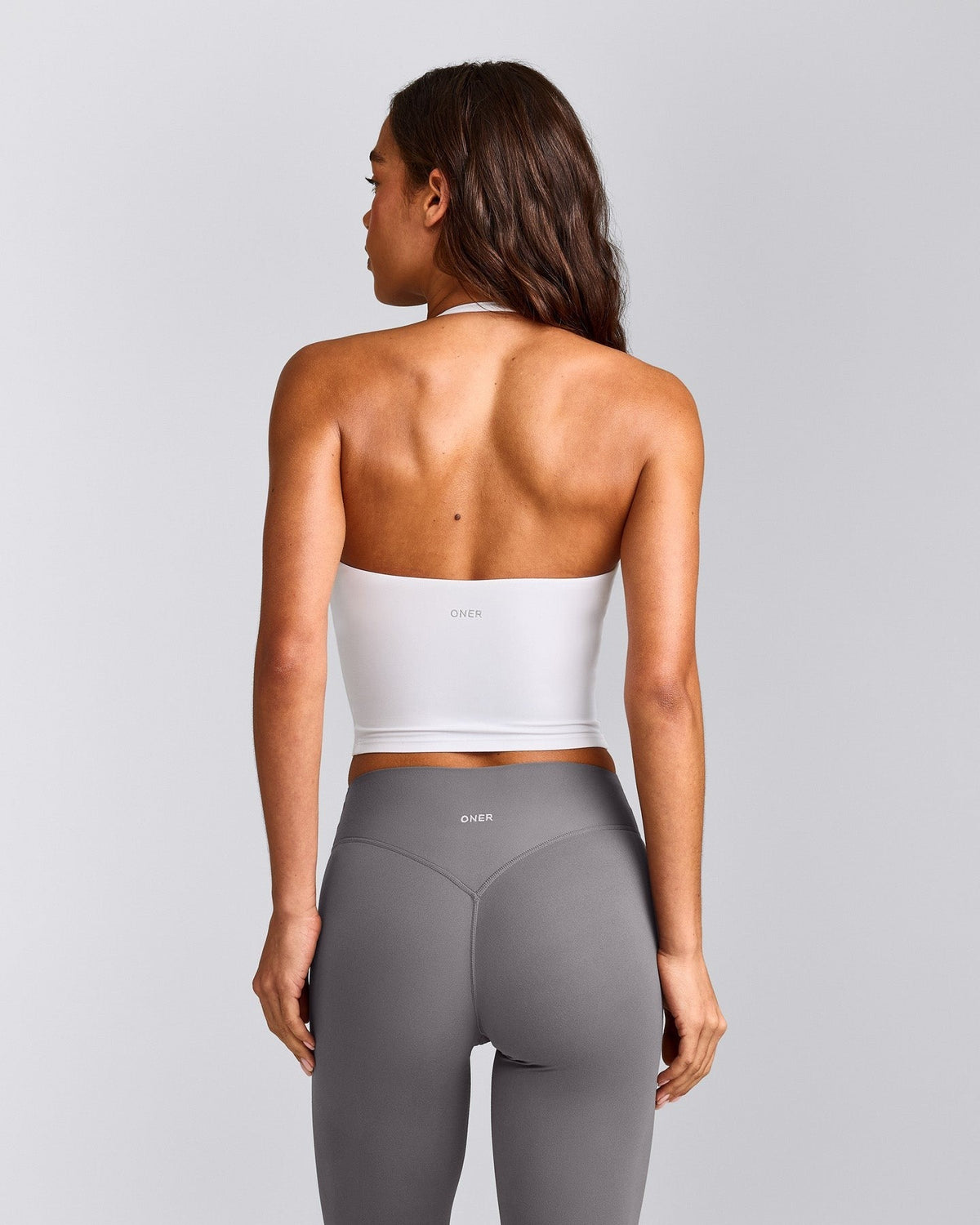 SoftMotionTM Strappy Halter Neck Mid Tank Top with Built in Bra Shelf | White