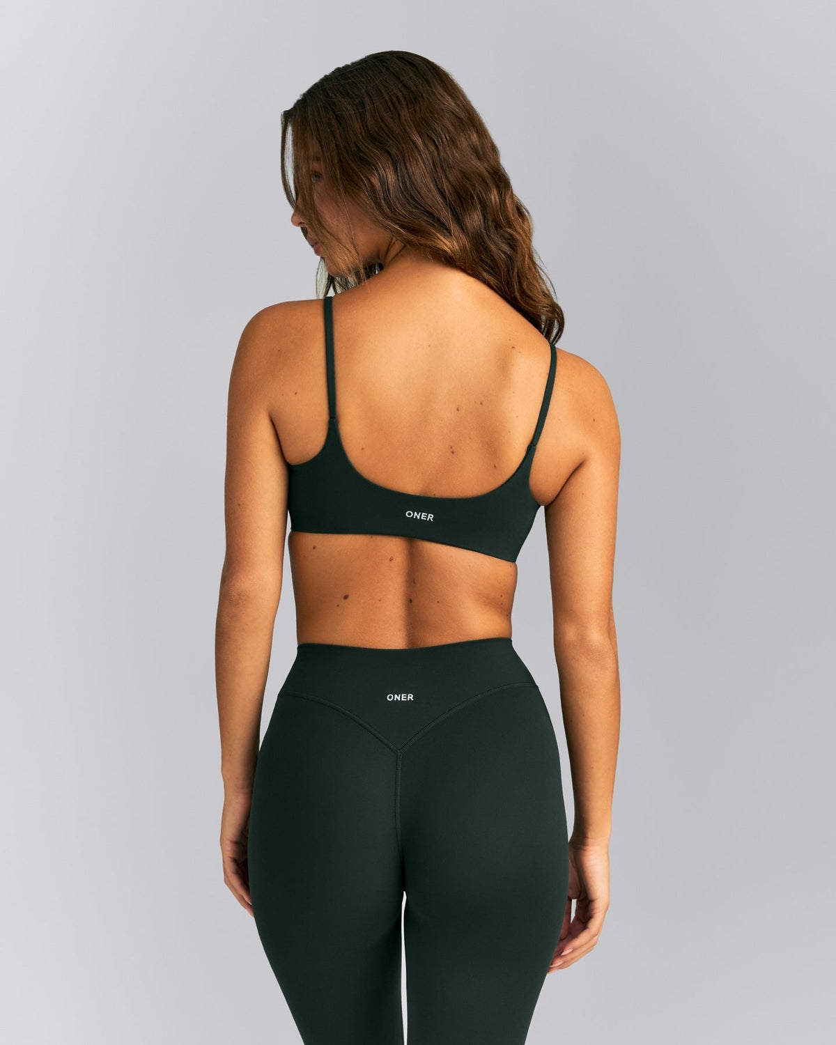 SoftMotionTM Strappy Sports Bra | Emerald Noir