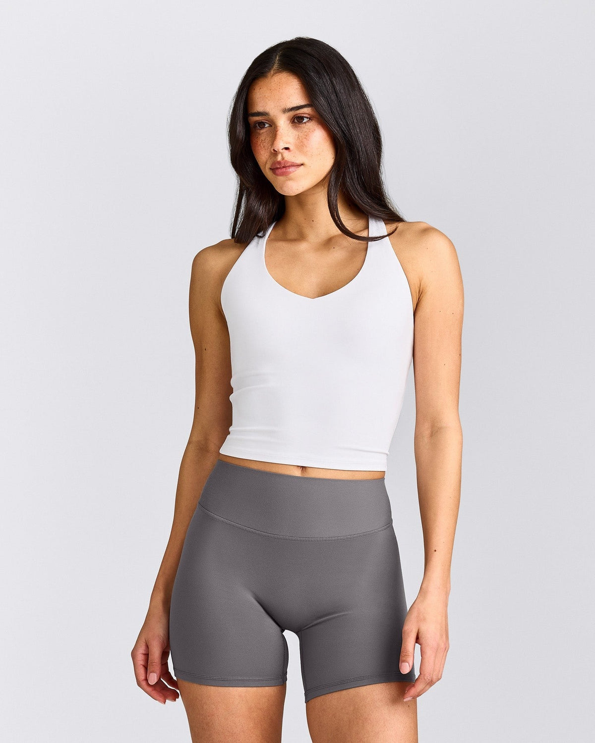 SoftMotionTM Racer Back Mid Tank Top With Built in Bra Shelf | White