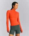 Oner Seamless Mid Weight Fitted 1/2 Zip Long Sleeve Top | Energy Orange